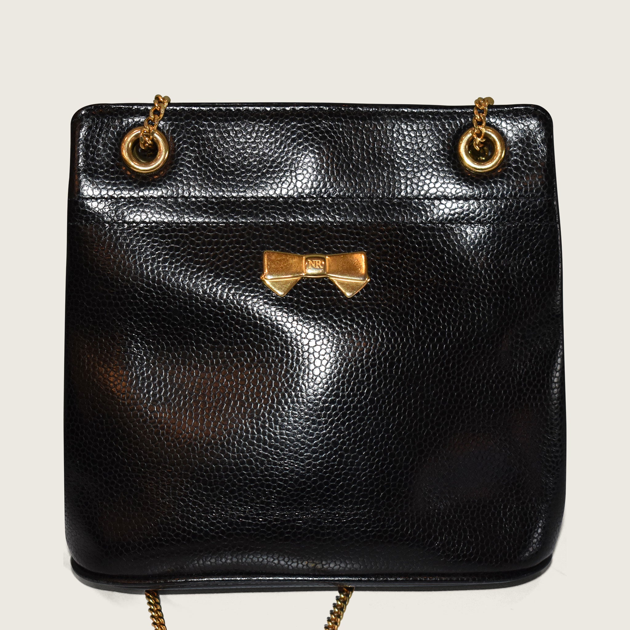 Vintage Nina Ricci Leather handbag. Made factory in Italy. Black.